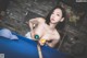 A woman is playing pool with a pool ball.
