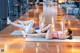 A couple of women laying on top of a yoga mat.